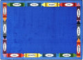 A blue educational child rug with crayons and bilingual colors