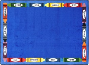 A blue educational child rug with crayons and bilingual colors