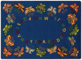 A navy blue alphabet rug with butterfly's