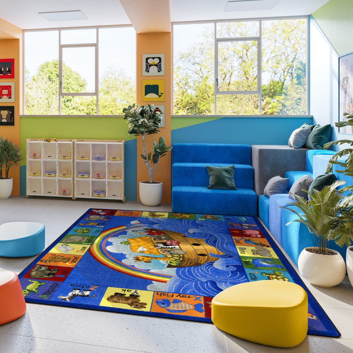Colorful children's playroom with a rug featuring cartoon characters, blue sofa, and yellow ottoman.