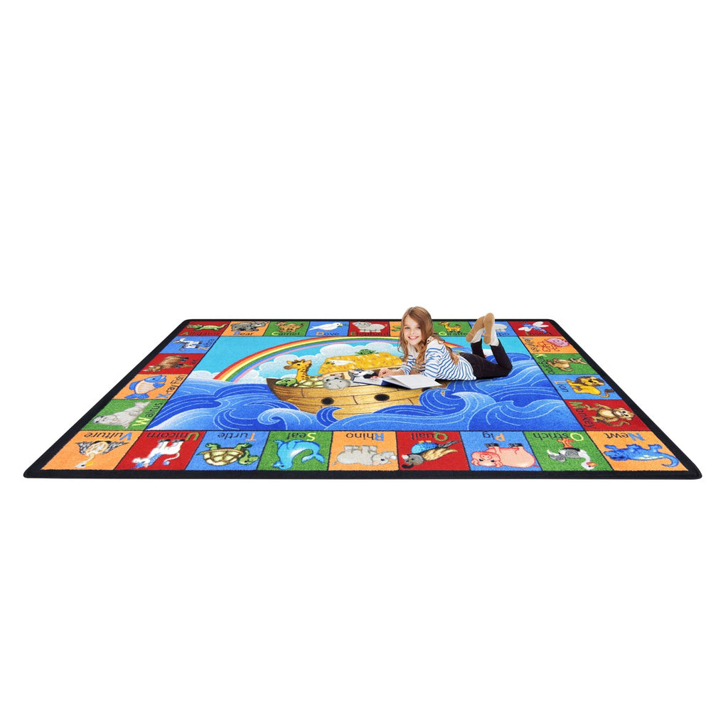 Colorful children's rug with cartoon designs on a white background