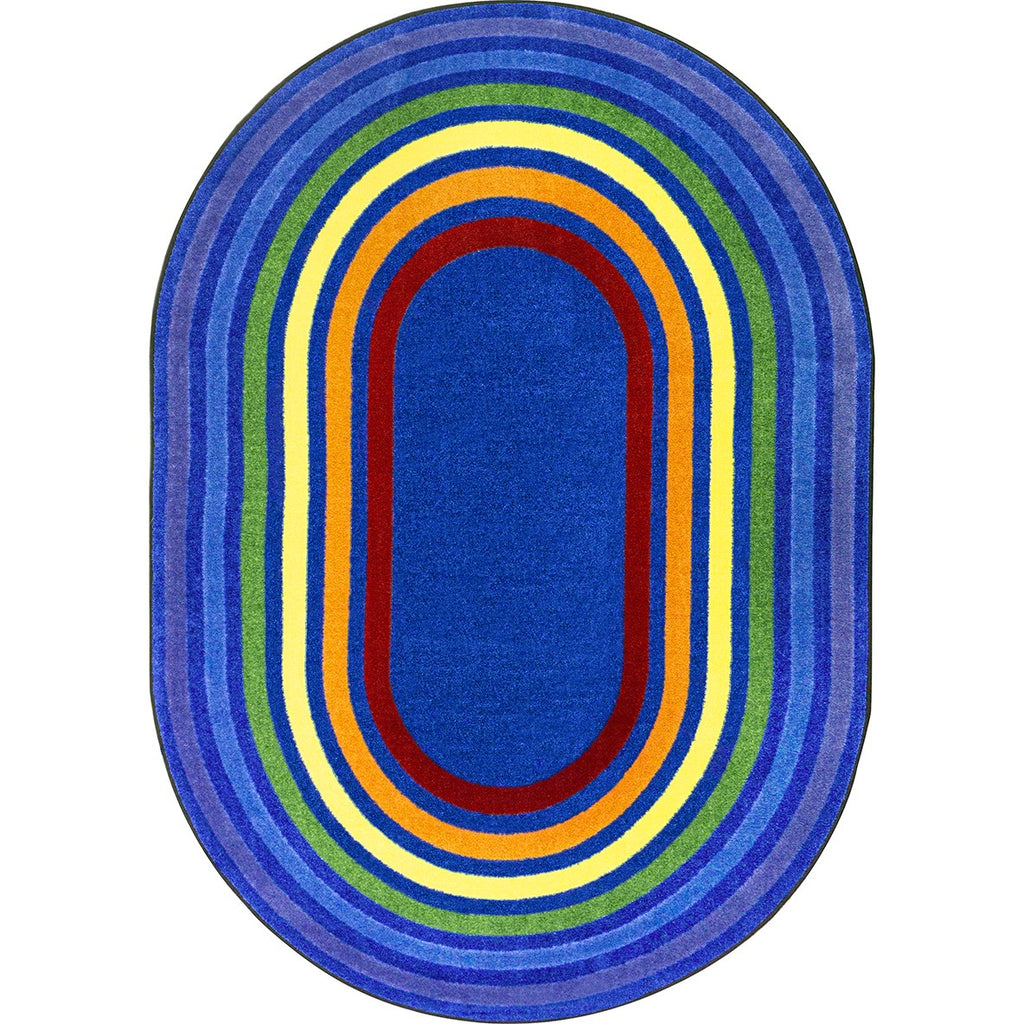 Oval-shaped rug with concentric colorful rings on a white background